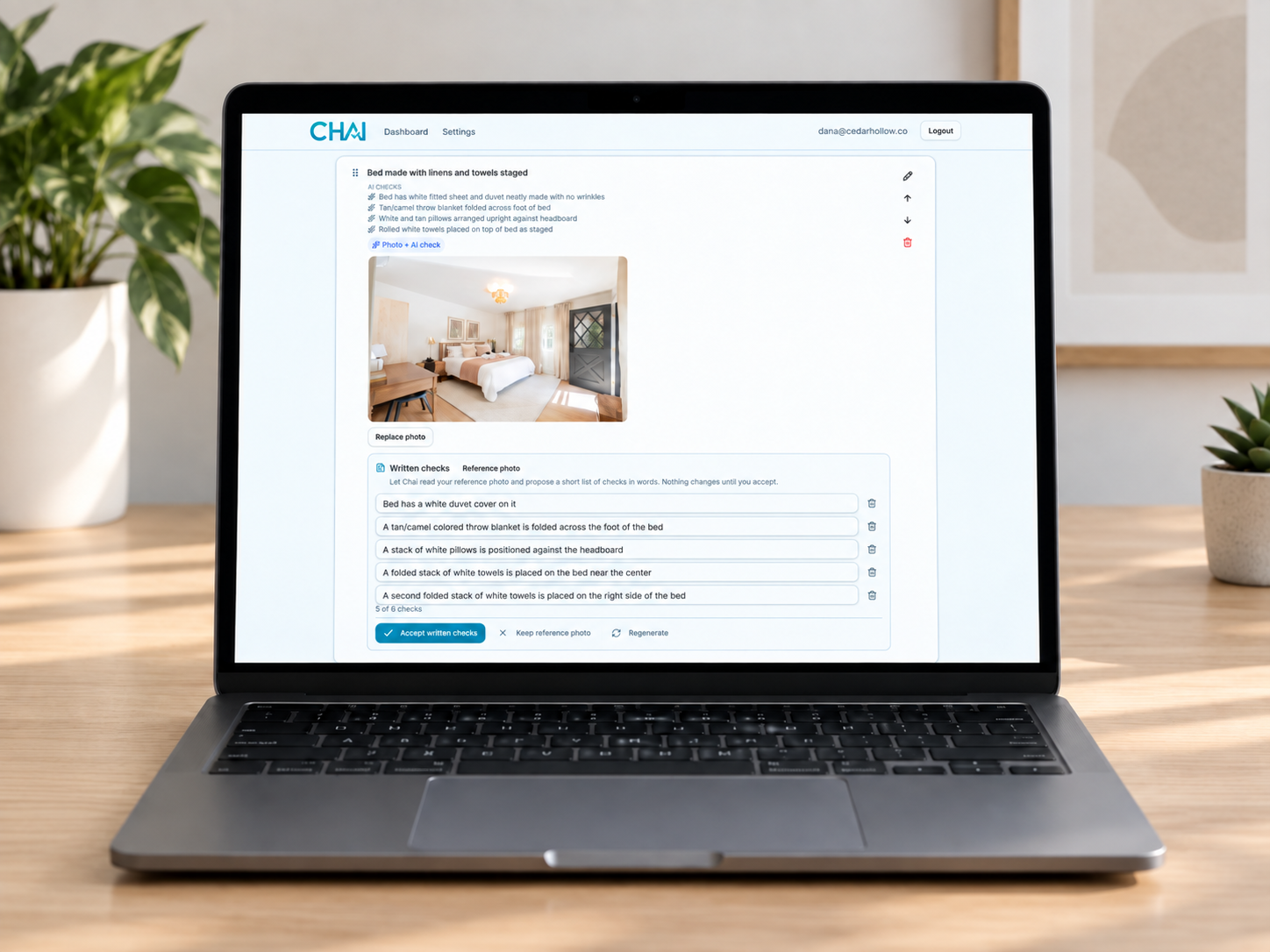 The Chai checklist editor on a laptop, showing a staged bed with AI checks, a reference photo, and the written checks Chai proposed from it.